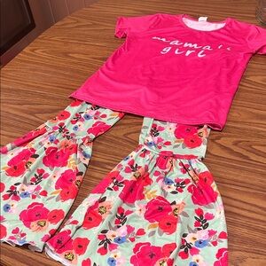 “Mama’s Girl” top and flower power bellbottoms.